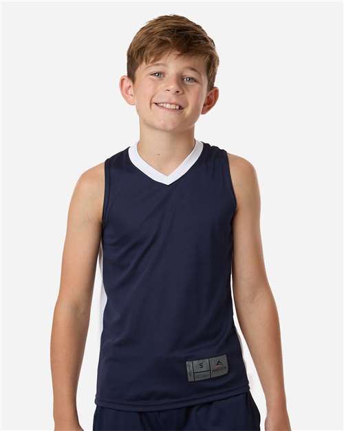 Augusta Sportswear Youth Match-Up Basketball Jersey — Navy/ White — On model · front