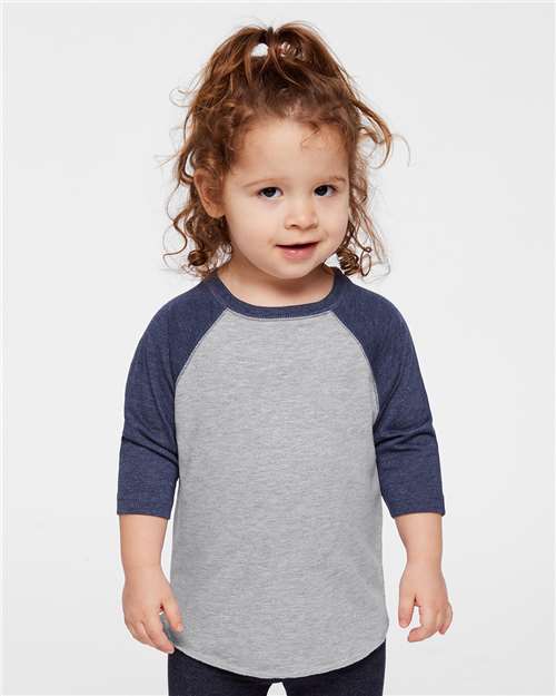 Rabbit Skins Toddler Baseball Fine Jersey Three-Quarter Sleeve Tee — Vintage Heather/ Vintage True Navy — On model · front