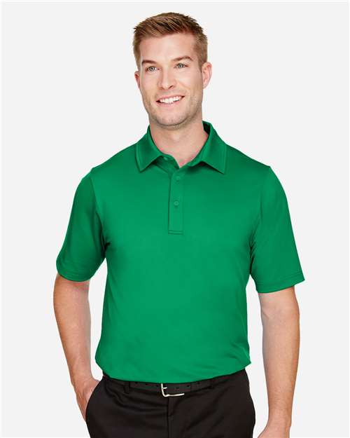 Devon & Jones Men's CrownLux Performance® Range Flex Polo — Kelly Green — On model · front