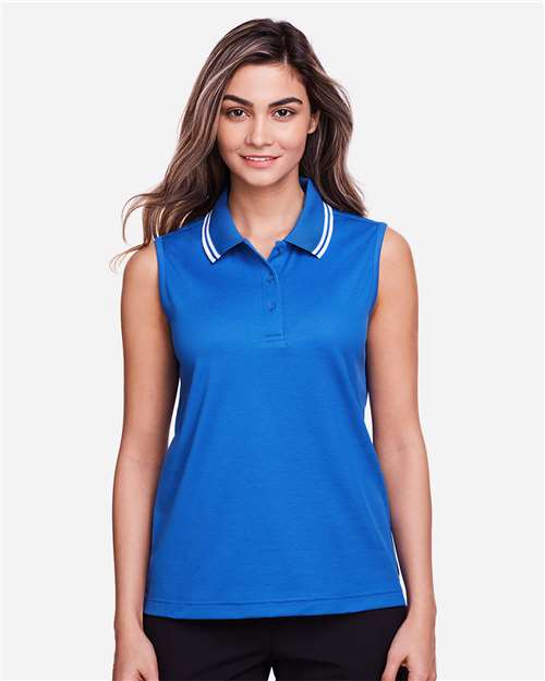 Devon & Jones Women's CrownLux Performance® Plaited Tipped Sleeveless Polo — French Blue/ White — On model · front