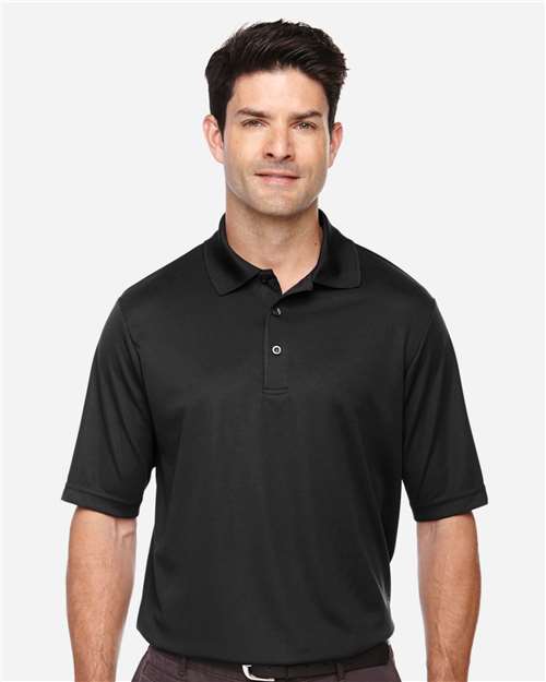 CORE365 Men's Tall Origin Performance Piqué Polo — Black — On model · front