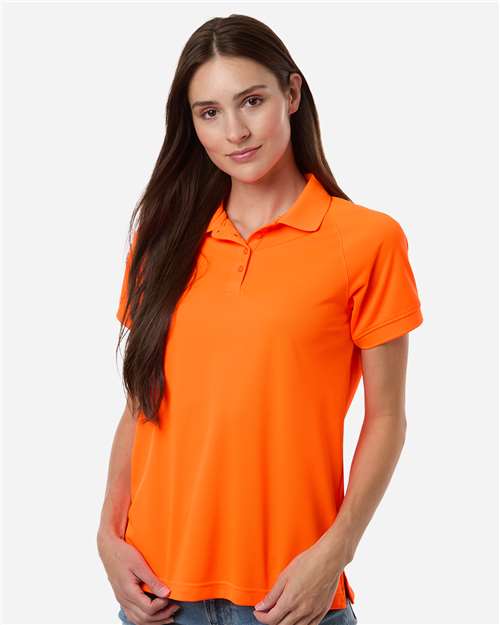 Harriton Women's Charge Snag and Soil Protect Polo — Safety Orange — On model · front