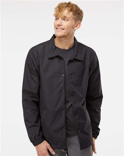 Independent Trading Co. Men's Water-Resistant Windbreaker Coach’s Jacket — Black/ Black — On model · front